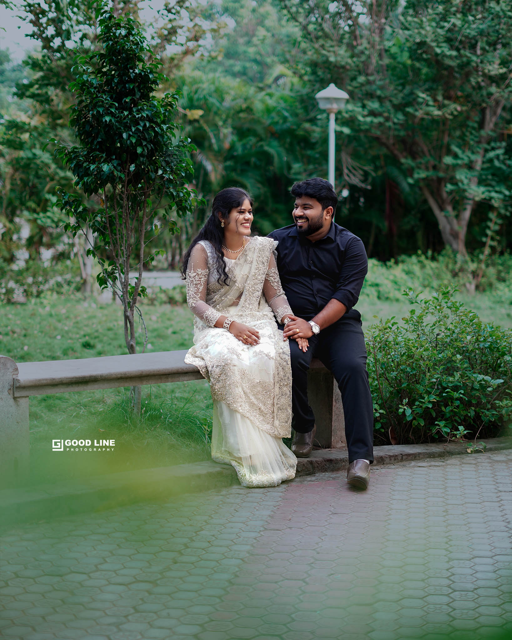 Couple under sunset sky